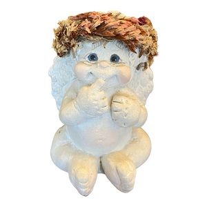 Vintage 1996 Dreamsicle cherub thinking with finger on mouth. 2.5” tall